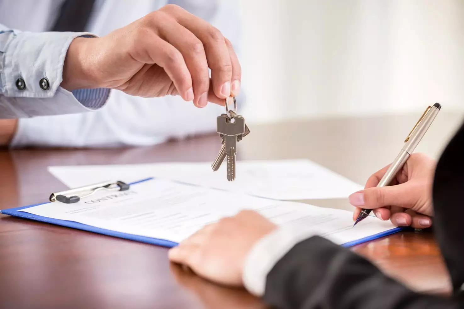 Realtor Holding a Key